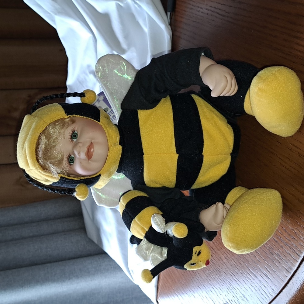 Porcelain Bumblebee doll, 15 in with rotating shoulders